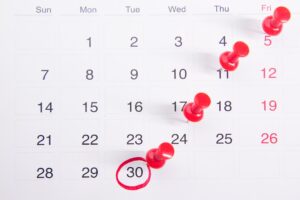 Calendario con appuntamenti multipli, simbolo dell'agenda condivisa in un poliambulatorio con più professionisti